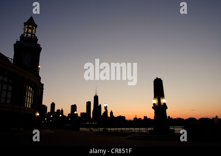 Illinois, Chicago. Chicago city skyline at sunset from Navy Pier. Stock Photo