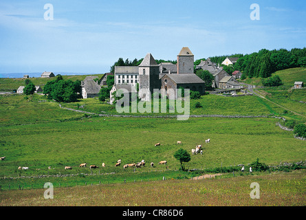 France, Aveyron, Aubrac, the village and Domerie, former abbey on the Way of St James, UNESCO World Heritage Stock Photo