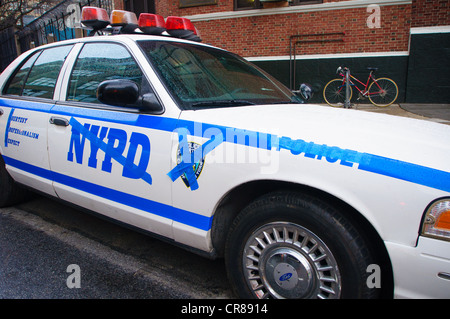 New York City Police Department cars with NYPD words and graphics taped over, at a TV taping in New York City. Stock Photo