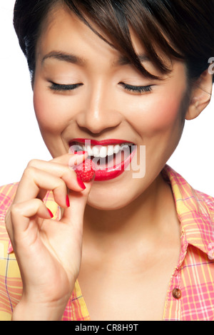beautiful fashion asian woman bite medicine pill for medical treatment ...