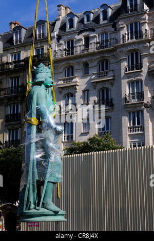 France, Paris, Place de la Nation, relocation of the statue Saint Louis on one of the two columns of the barrier of the throne Stock Photo