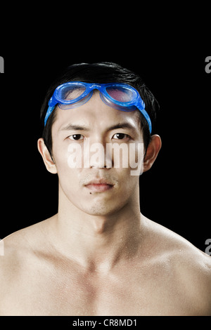 Swimmer wearing swimming goggles Stock Photo