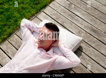 Carfree Man Laying On The Floor Thinking Stock Photo - Download Image Now - Lying  Down, Men, People - iStock