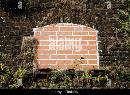 Newly bricked up window of an industrial ruin, North Rhine-Westphalia, Germany, Europe Stock Photo