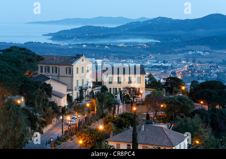 View across Bormes-les-Mimosas towards the Îles d'Hyères islands, Provence-Alpes-Côte d'Azur region, France, Europe Stock Photo