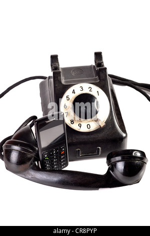 Photo of modern phone and old phone compared with themselves. Stock Photo