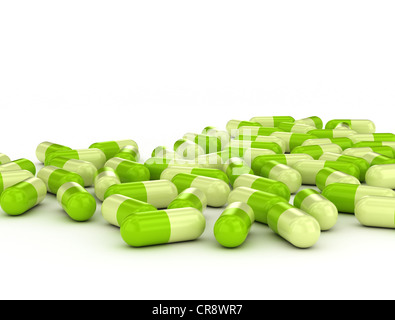 Green pills on white background herbal medicine Stock Photo
