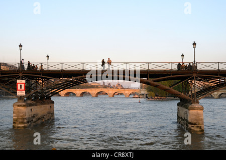 Couple standing on Pont des Arts bridge, Paris, France, Europe Stock Photo