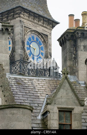 Clock tower of the historic medieval Dunrobin Castle in the northern highlands of Scotland. Stock Photo