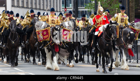 The band of the Household Cavalry ride to Westminster Hall to escort the Queen in a carriage procession Stock Photo
