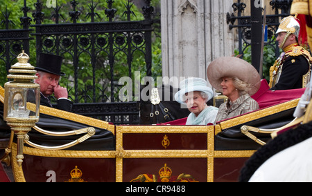 The Queen with the Prince of Wales and Duchess of Cornwall leave Westminster Hall in a carriage procession to Buckingham Palace Stock Photo