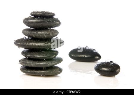 wet zen stones isolated over a white background. Stock Photo