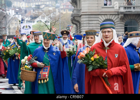 ZURICH - APRIL 16: Members of traditional annual spring parade of Guilds, symbolising end of the winter Stock Photo