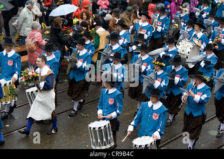 ZURICH - APRIL 16, 2012: Members of Carpenters' guild (Zunft zur Zimmerleuten) march in traditional spring parade of Guilds Stock Photo