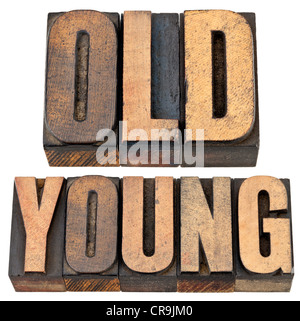 old and young antonym - age or generations concept -- isolated text in vintage letterpress wood type Stock Photo