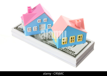 Toy Houses with Dollar Notes Stock Photo