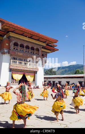 dance performers at Tsechu festival, Gangtey Gompa Monastery, Phobjikha valley, Bhutan, Asia Stock Photo