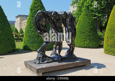 The Three Shades, by Auguste Rodin. Bronze sculpture in the gardens of the Musee Rodin in Paris. Stock Photo