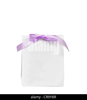 Blank note with purple bow isolated on white Stock Photo