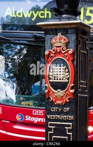 City of Westminster crest embossing on wrought iron street light. London, England Stock Photo