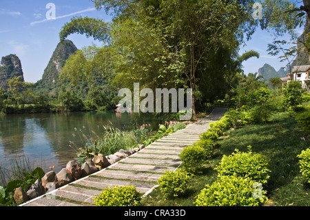 Path along the river near Yangshuo - Guangxi province - China Stock Photo