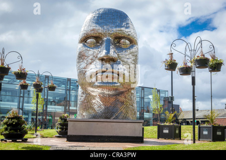 THe statue by Rick Kirby entitled the Face of Wigan in the Wiend in the town centre. Stock Photo