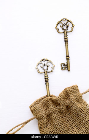 Antique key on white background Stock Photo