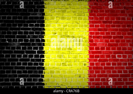 An image of the Belgium flag painted on a brick wall in an urban location Stock Photo