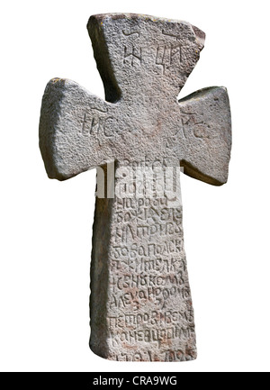 The ancient medieval Slavic stone cross isolated on white background Stock Photo