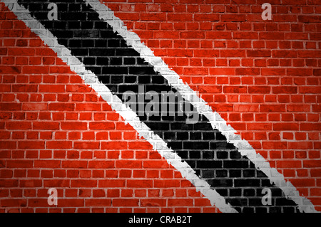 An image of the Trinidad and Tobago flag painted on a brick wall in an urban location Stock Photo