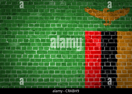 An image of the Zambia flag painted on a brick wall in an urban location Stock Photo
