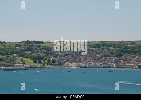 Swanage town view across the bay from Ballard Down on beautiful June summer day Stock Photo
