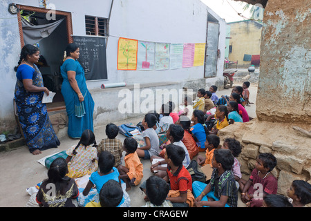 Teachers and pupils, night school, Sevandhipalayam near Karur, Tamil Nadu, South India, Asia