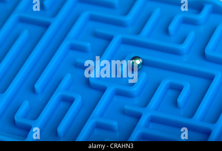 Blue maze with a metal ball Stock Photo