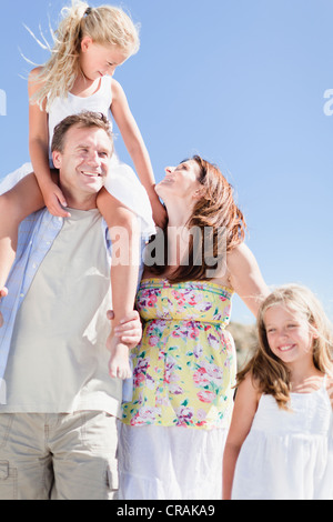 Family walking together outdoors Stock Photo