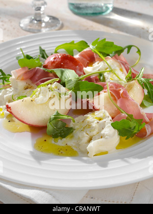 Burrata and peaches summer salad, white background. Italian recipe ...