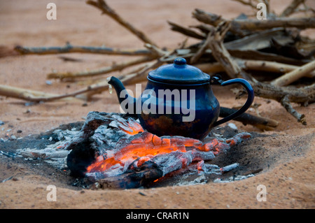 Ancient tea kettle on campfire Stock Photo - Alamy