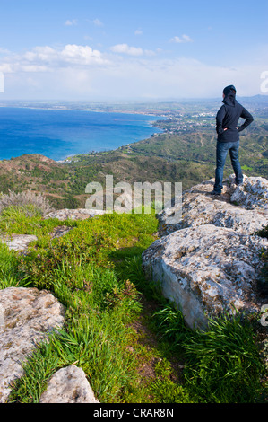 Woman enjoying the view over the Roman excavation site of Vouni, Northern Cyprus, Cyprus Stock Photo