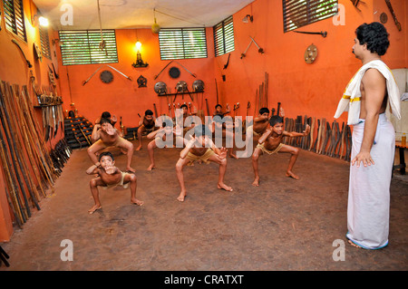 Students and a teacher at a Kalaripayattu school, martial art, Calicut, also known as Kozhikode, Kerala, southern India, India Stock Photo