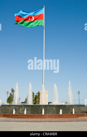 Azerbaijani flag in the wind in a park on the waterfront, Baku, Azerbaijan, Middle East Stock Photo