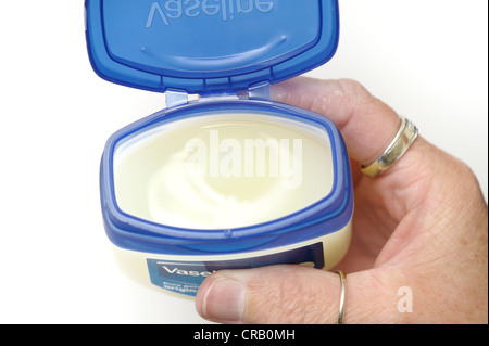 a jar of vaseline with lid open Stock Photo