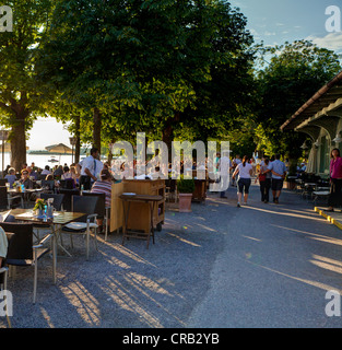 Beer garden in the evening light, Herrsching am Ammersee, Lake Ammer, Upper Bavaria, Bavaria, Germany, Europe Stock Photo