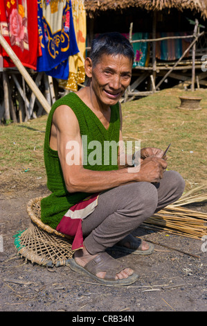 Man carving in the traditional village of Paia near Along, Arunachal Pradesh, North East India, India, Asia Stock Photo