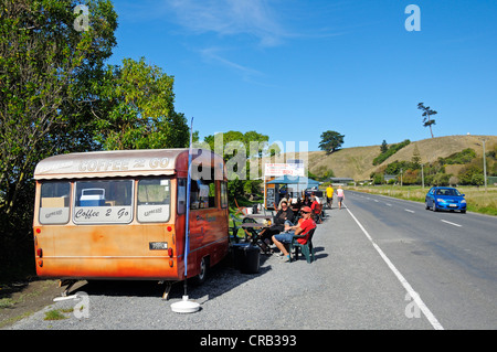 Takeaway in a caravan offering spiny lobsters, seafood, fish and coffee, road along the coast near Kaikoura, South Island Stock Photo