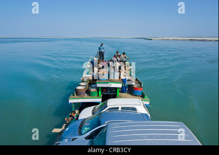 Ferry loaded with people and cars, on the Brahmaputra River, Assam, North East India, India, Asia Stock Photo