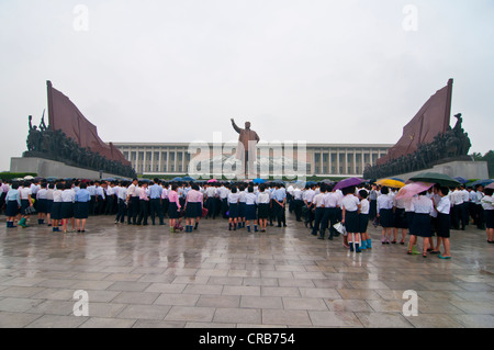 Visitors at the Kim Il Sung Monument on Mansu Hill, Pyongyang, North Korea, Asia Stock Photo