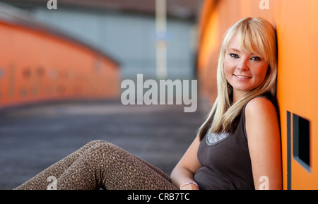 Young blond woman smiling Stock Photo