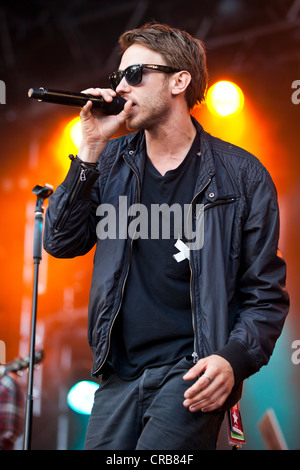 German songwriter and rapper Thomas Huebner aka Clueso performing live at the Heitere Open Air music festival in Zofingen Stock Photo