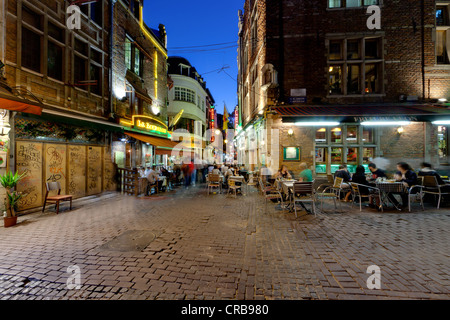 Street restaurants in the historic centre at night, Beenhouwersstraat, Brussels, Belgium, Europe Stock Photo