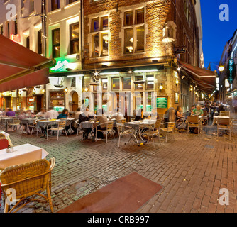 Guests sitting in street restaurants in the old town, Beenhouwersstraat, Brussels, Belgium, Europe Stock Photo